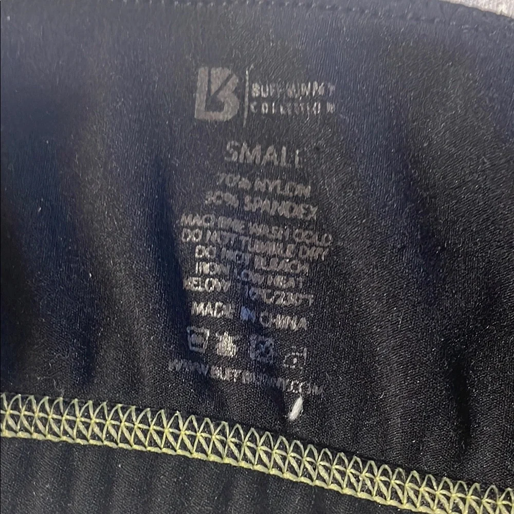 BuffBunny Black and Pink Women's Top with Yellow Zipper - Picture 2 of 3